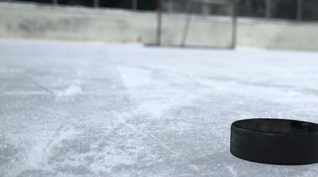 Ice hockey puck on ice 20180112